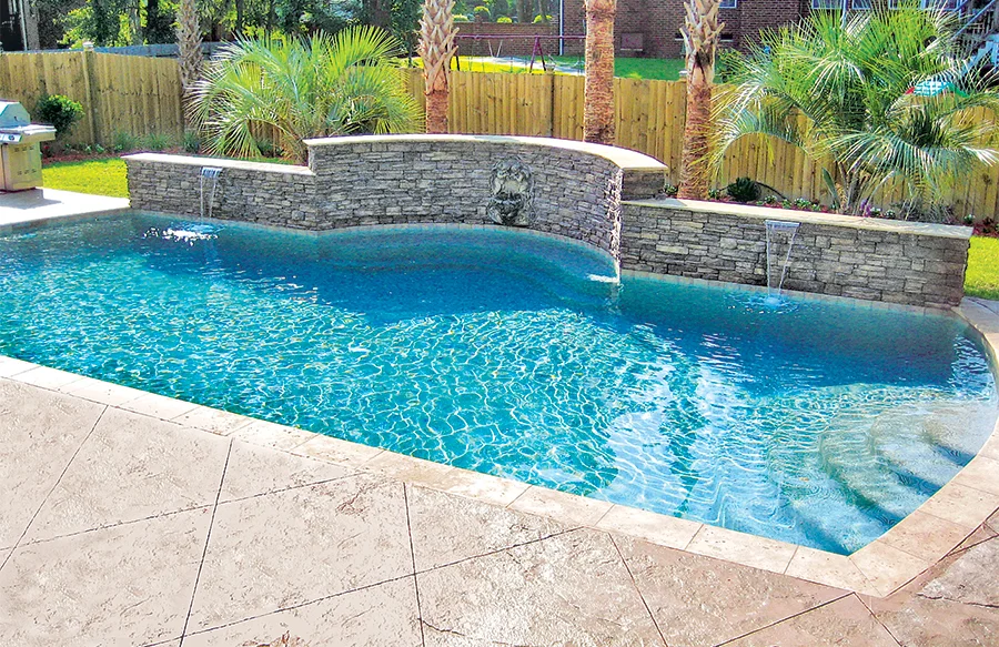swimming pool deck sealed stamped concrete by Bundaberg Concreters
